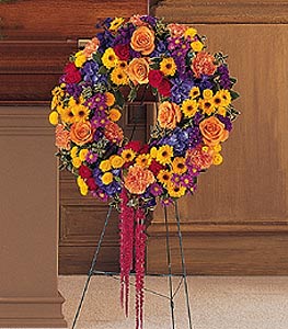 Celebration Wreath by Rich Mar Florist