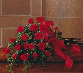 Red Rose Tribute Half Casket Spray by Rich Mar Florist
