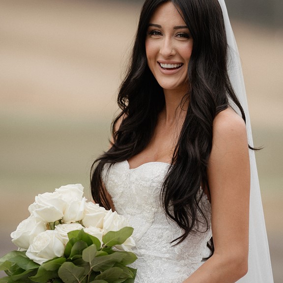 Kyle Weatherman's Wedding by Rich Mar Florist bride flowers
